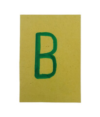 Green letter b written with a marker on a textured yellow paper card isolated on transparent background © Mohidul