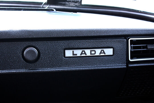 Vinnytsia, Ukraine; September 05, 2026. Soviet VAZ 2104 Lada glove compartment. Glove compartment old Soviet car. VAZ 2104 Lada Station Wagon badge. VAZ logo and emblem. VAZ 2104 Lada interior. Soviet