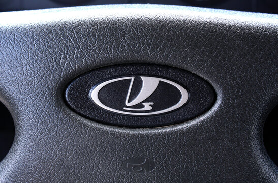 Vinnytsia, Ukraine; September 05, 2026. Close up VAZ 2104 Lada Station Wagon steering wheel. Soviet Car VAZ logo and emblem. VAZ 2104 Lada interior. Soviet and Russian car logo. 