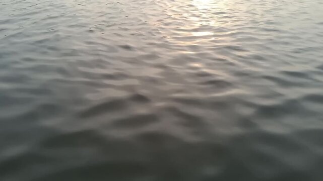Gentle Water Ripples with Sunlight Reflection Nature Background