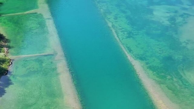 Aerial View of a Clear Alpine River in Stoos Valley, Switzerland