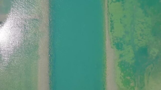 Turquoise Alpine River Surrounded by Forest Near Stoos