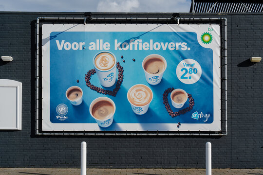 August 21, 2026, Amsterdam, Netherlands - Billboard advertising AH to go coffee at a BP station