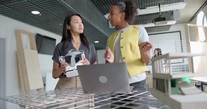 Two Businesswomen Collaborating in Modern Office Space