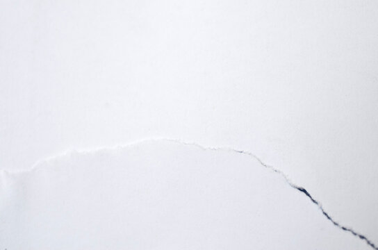 Torn White Paper Edge Background with Minimal Copy Space