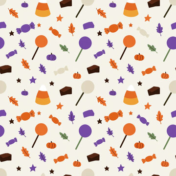Colorful Halloween candy pattern with sweets, pumpkins, stars and autumn leaves.