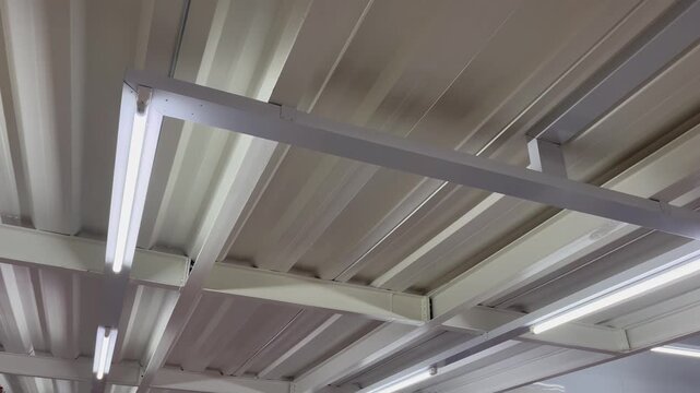 Bright LED Tube Light on Steel Truss Roof Structure