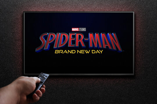 TV screen playing Spider-Man Brand New Day trailer or movie. Man turns on TV with remote control. Astana, Kazakhstan - July 31, 2026.