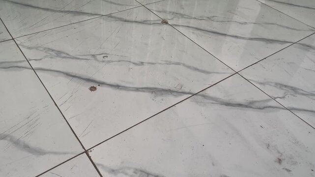 High angle shot of minimalist marble pattern floor tiles grid