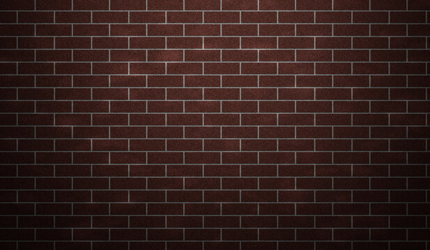 A red brick wall displays a repeating pattern with dark mortar lines and subtle lighting variations masonry texture