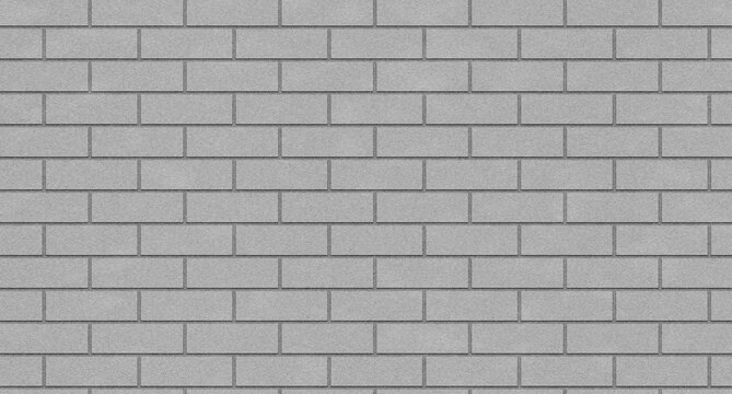 A gray brick wall texture fills the frame showcasing a repeating rectangular pattern stone masonry building construction pattern