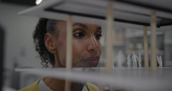 Architect Examining Design Details of Architecture Model - Close up