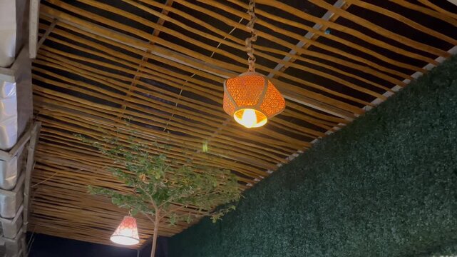 Horizontal b roll of warm ambient light in sustainable restaurant interior