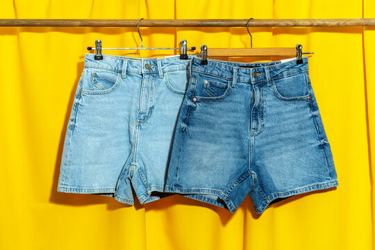 Close up of short blue jeans
