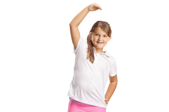 Girl stretching arm and smiling, pe class and exercise concept