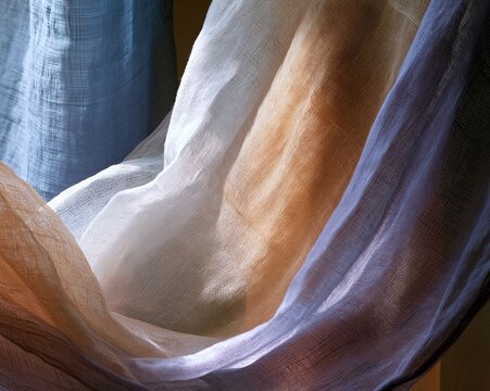 Sharad purnima cotton muslin fabric with soft folds and a damp texture, glowing in pale blue and peach tones for packaging and background design