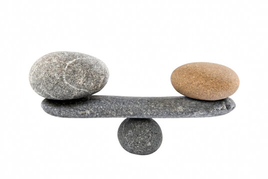 Balanced Zen Stones arranged as a Scale
