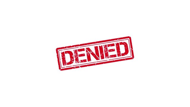 Red denied rubber stamp impression on white background, grunge texture official rejection concept rejected