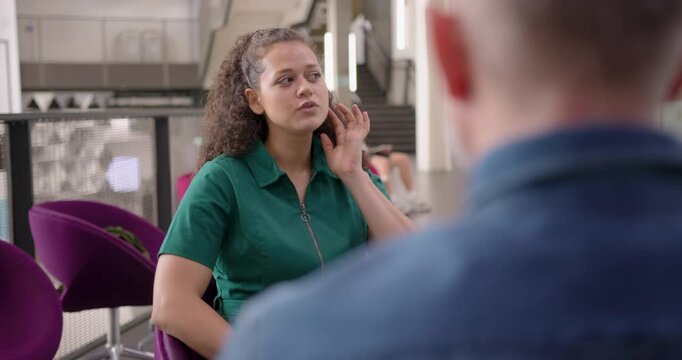 Engaging Job Interview with a Young Woman in Open Plan Modern Office
