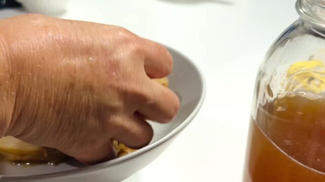 Hand Removing Kombucha SCOBY From Jar Video