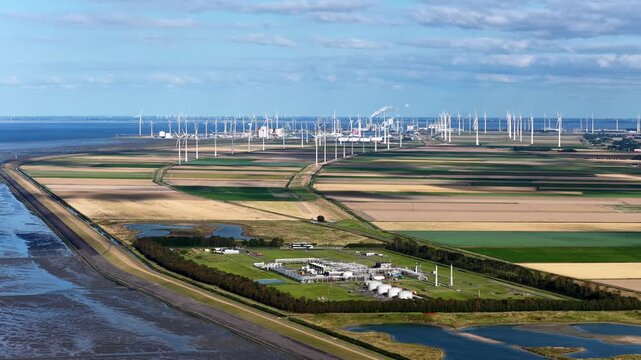 Aerial view of gas transmission infrastructure and Eemshaven in the background in the Netherlands