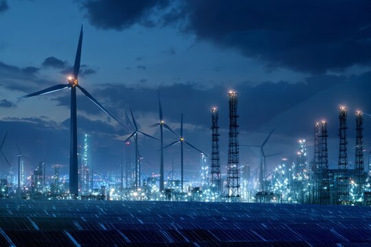 Wind Turbines And Solar Panels At Night Industrial Energy Concept