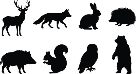 Fototapeta premium Collection of forest wildlife animal black silhouettes including deer fox rabbit hedgehog boar squirrel owl and bear in image.