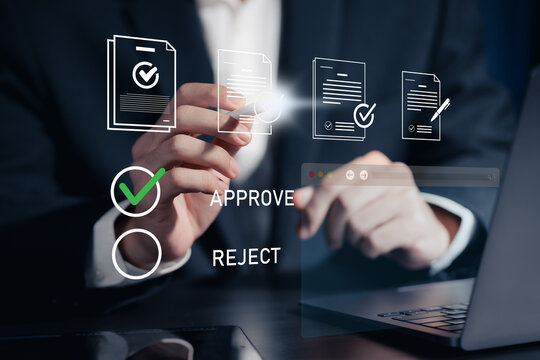 Document approval concept with a business professional reviewing digital files on a laptop, selecting approved status in an online workflow, compliance, verification, checklist, management