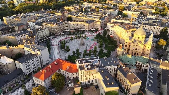 Drone view over Liberty Square (Plac Wolnosci) at sunset in Lodz, Poland