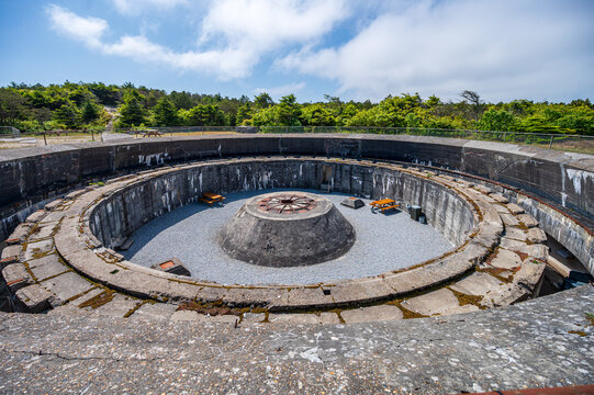 A large concrete circular pit for a 38cm naval gun emplacement at Hanstholm 2 fortress battery in Denmark.