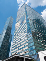 Fototapeta premium Modern high-rise buildings in Moscow city business district against the sky, urban architecture and contemporary cityscape
