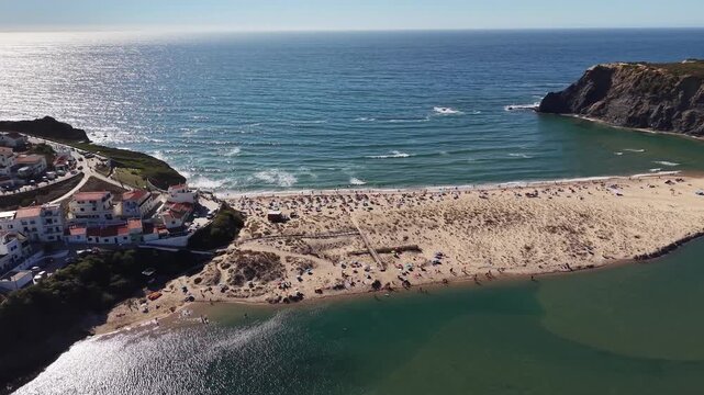 Aerial view of odeceixe beach and river mouth in portugal