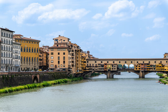 Ponte Vecchio, a famous medieval stone arch bridge that spans the Arno River in Florence, Italy