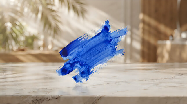 Blue abstract paint splash explosion isolated on a light gray background