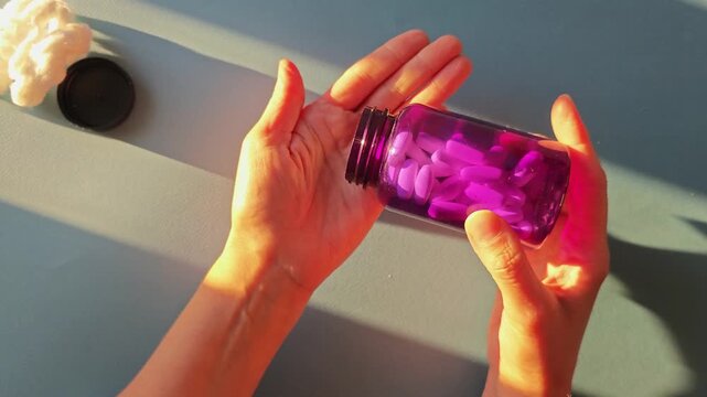 How to open a medication bottle and take out pills during morning routine