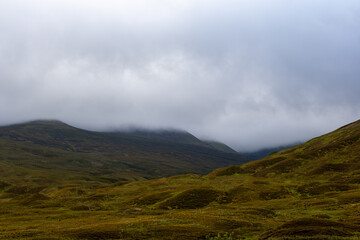 Obraz premium Misty Highland Landscape in Scotland, UK.