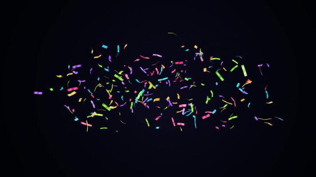 Colorful confetti explosion falling slowly over a dark background for celebration motion graphics