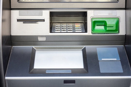Automated teller machine keypad and blank screen ready for secure banking transactions, showing modern self-service cash machine technology for withdrawals, deposits and payments
