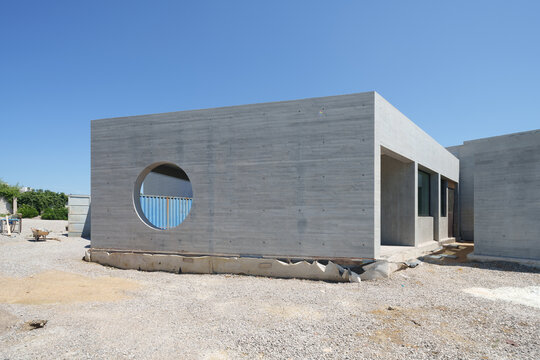 Modern concrete hotel building under construction