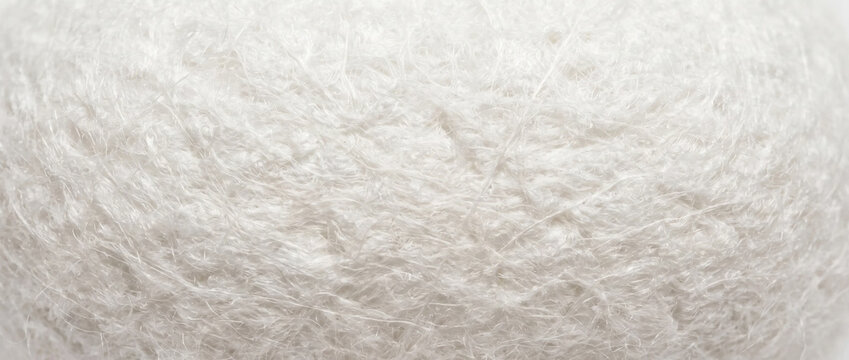 Silk cocoon fiber white texture. Raw natural silkworm cocoon closeup background
