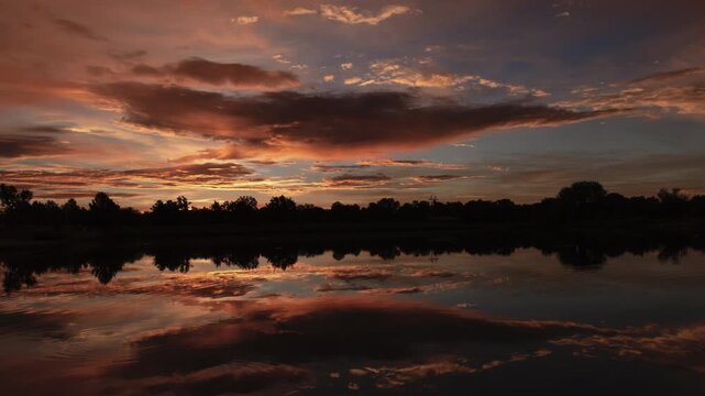 Beautiful Full Sunrise over Water Wide Angle Timelapse