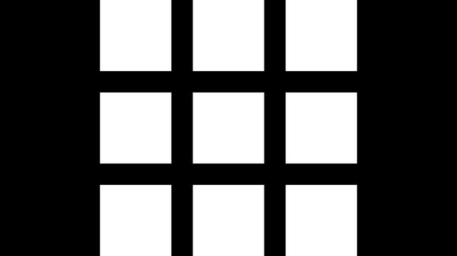 Nine white squares arranged in a symmetrical grid pattern on a solid black surface