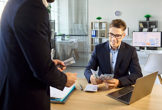 Employee and manager handle salary cash payroll payment. Worker receives banknotes in office counting money. Text highlights wages, finance and income. Clear payroll cash compensation concept.