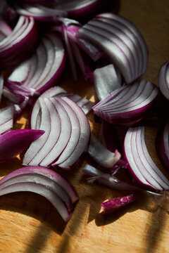 Sliced red onion prepared for homemade pickling