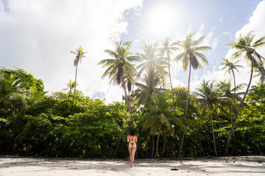 Woman on secluded tropical beach in Costa Rica