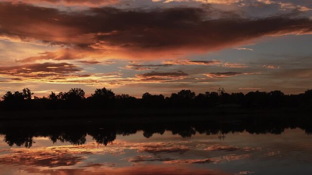 Beautiful Sunrise over Water Timelapse Zoom Out