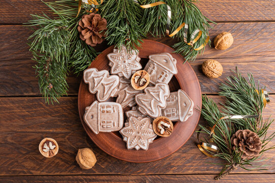 Christmas gingerbread cookies with pine and rustic holiday decor