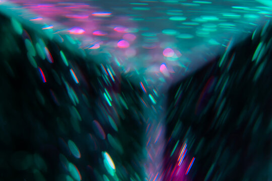 Abstract neon light trail with colorful bokeh background