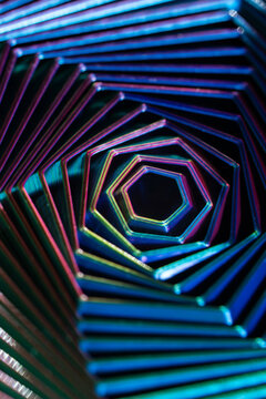 Neon hexagonal tunnel with iridescent geometric pattern