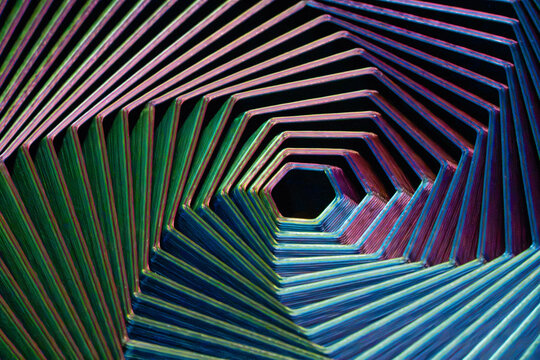 Abstract geometric spiral with vibrant neon line pattern